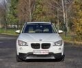 Белый БМВ Х1, объемом двигателя 2 л и пробегом 210 тыс. км за 10999 $, фото 1 на Automoto.ua