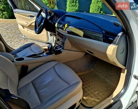 Білий БМВ Х1, об'ємом двигуна 2 л та пробігом 149 тис. км за 13300 $, фото 27 на Automoto.ua