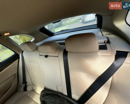 Білий БМВ Х1, об'ємом двигуна 2 л та пробігом 203 тис. км за 13100 $, фото 5 на Automoto.ua