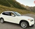 Білий БМВ Х1, об'ємом двигуна 2 л та пробігом 160 тис. км за 12900 $, фото 1 на Automoto.ua