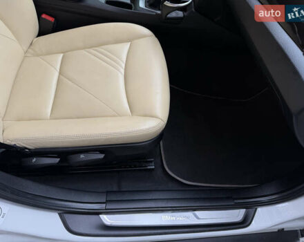 Білий БМВ Х1, об'ємом двигуна 2 л та пробігом 113 тис. км за 13990 $, фото 32 на Automoto.ua