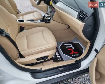 Белый БМВ Х1, объемом двигателя 2 л и пробегом 150 тыс. км за 12300 $, фото 75 на Automoto.ua