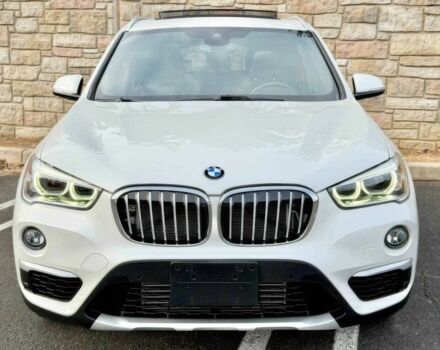 Белый БМВ Х1, объемом двигателя 2 л и пробегом 49 тыс. км за 10000 $, фото 1 на Automoto.ua