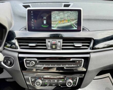 Белый БМВ Х1, объемом двигателя 2 л и пробегом 49 тыс. км за 10000 $, фото 12 на Automoto.ua