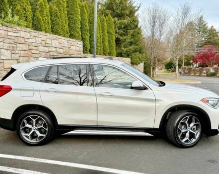 Белый БМВ Х1, объемом двигателя 2 л и пробегом 49 тыс. км за 10000 $, фото 6 на Automoto.ua