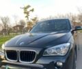Черный БМВ Х1, объемом двигателя 2 л и пробегом 189 тыс. км за 13328 $, фото 1 на Automoto.ua