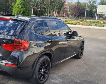 Чорний БМВ Х1, об'ємом двигуна 2 л та пробігом 215 тис. км за 13500 $, фото 2 на Automoto.ua