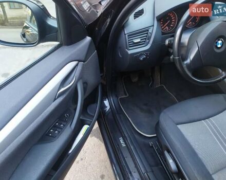 Черный БМВ Х1, объемом двигателя 2 л и пробегом 230 тыс. км за 10000 $, фото 1 на Automoto.ua