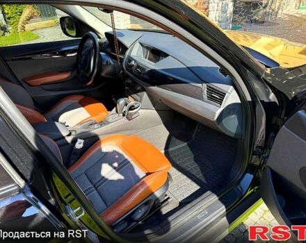 Чорний БМВ Х1, об'ємом двигуна 2 л та пробігом 300 тис. км за 12500 $, фото 1 на Automoto.ua