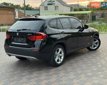 Чорний БМВ Х1, об'ємом двигуна 2 л та пробігом 305 тис. км за 9900 $, фото 1 на Automoto.ua