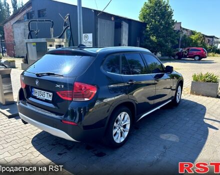 Чорний БМВ Х1, об'ємом двигуна 2 л та пробігом 205 тис. км за 12500 $, фото 1 на Automoto.ua