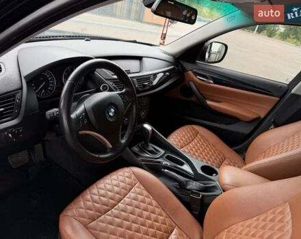 Чорний БМВ Х1, об'ємом двигуна 2 л та пробігом 114 тис. км за 11999 $, фото 5 на Automoto.ua
