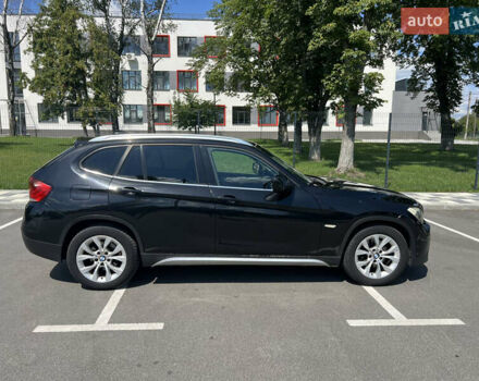 Черный БМВ Х1, объемом двигателя 2 л и пробегом 313 тыс. км за 10999 $, фото 1 на Automoto.ua