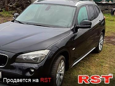 Черный БМВ Х1, объемом двигателя 2 л и пробегом 218 тыс. км за 13500 $, фото 1 на Automoto.ua