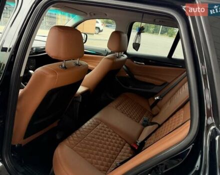 Чорний БМВ Х1, об'ємом двигуна 2 л та пробігом 114 тис. км за 11999 $, фото 3 на Automoto.ua
