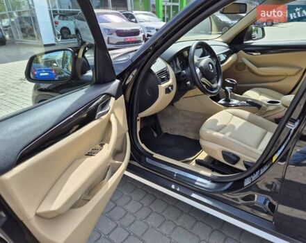 Чорний БМВ Х1, об'ємом двигуна 2 л та пробігом 200 тис. км за 10500 $, фото 4 на Automoto.ua