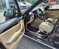Чорний БМВ Х1, об'ємом двигуна 2 л та пробігом 200 тис. км за 10500 $, фото 4 на Automoto.ua