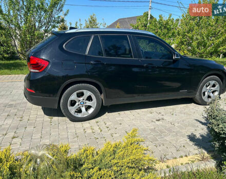 Чорний БМВ Х1, об'ємом двигуна 2 л та пробігом 122 тис. км за 12999 $, фото 1 на Automoto.ua