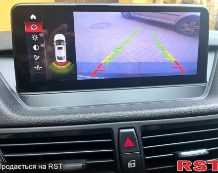 Чорний БМВ Х1, об'ємом двигуна 2 л та пробігом 135 тис. км за 11000 $, фото 2 на Automoto.ua