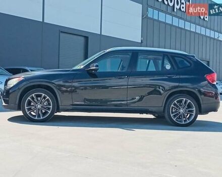 Чорний БМВ Х1, об'ємом двигуна 2 л та пробігом 192 тис. км за 12090 $, фото 1 на Automoto.ua