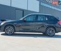 Чорний БМВ Х1, об'ємом двигуна 2 л та пробігом 192 тис. км за 12090 $, фото 1 на Automoto.ua