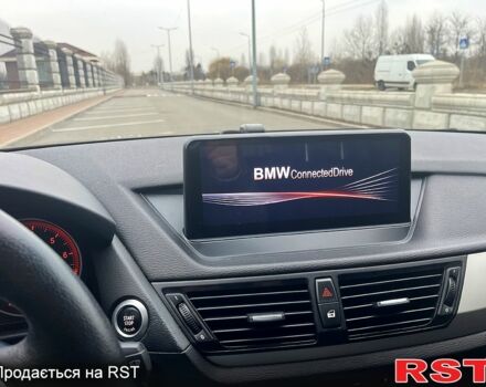 Чорний БМВ Х1, об'ємом двигуна 2 л та пробігом 135 тис. км за 11000 $, фото 5 на Automoto.ua