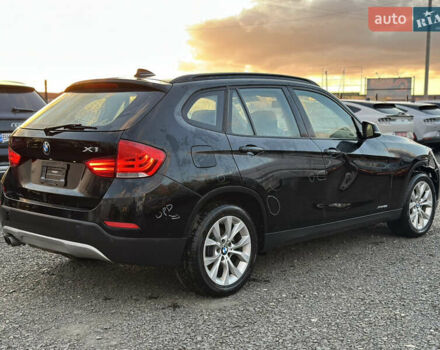 Чорний БМВ Х1, об'ємом двигуна 2 л та пробігом 126 тис. км за 9000 $, фото 4 на Automoto.ua