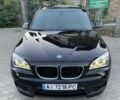 Чорний БМВ Х1, об'ємом двигуна 2 л та пробігом 243 тис. км за 15500 $, фото 1 на Automoto.ua