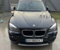 Чорний БМВ Х1, об'ємом двигуна 2 л та пробігом 155 тис. км за 12200 $, фото 1 на Automoto.ua