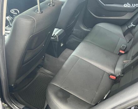 Чорний БМВ Х1, об'ємом двигуна 2 л та пробігом 345 тис. км за 11490 $, фото 20 на Automoto.ua