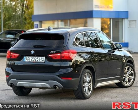 Черный БМВ Х1, объемом двигателя 2 л и пробегом 180 тыс. км за 18000 $, фото 2 на Automoto.ua