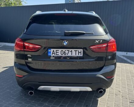 Чорний БМВ Х1, об'ємом двигуна 2 л та пробігом 235 тис. км за 17000 $, фото 2 на Automoto.ua
