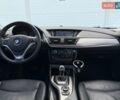 Чорний БМВ Х1, об'ємом двигуна 2 л та пробігом 154 тис. км за 12800 $, фото 1 на Automoto.ua