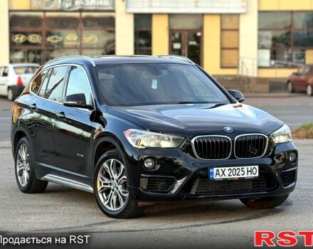 Черный БМВ Х1, объемом двигателя 2 л и пробегом 180 тыс. км за 18000 $, фото 1 на Automoto.ua