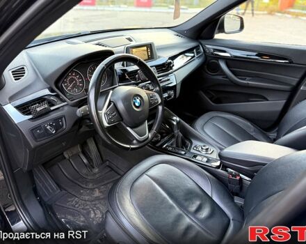 Черный БМВ Х1, объемом двигателя 2 л и пробегом 180 тыс. км за 18000 $, фото 4 на Automoto.ua