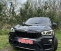 Чорний БМВ Х1, об'ємом двигуна 2 л та пробігом 148 тис. км за 15100 $, фото 4 на Automoto.ua