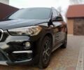 Чорний БМВ Х1, об'ємом двигуна 2 л та пробігом 125 тис. км за 13999 $, фото 1 на Automoto.ua