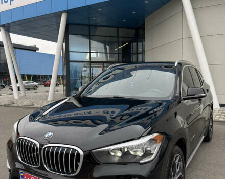 Чорний БМВ Х1, об'ємом двигуна 2 л та пробігом 104 тис. км за 15800 $, фото 1 на Automoto.ua