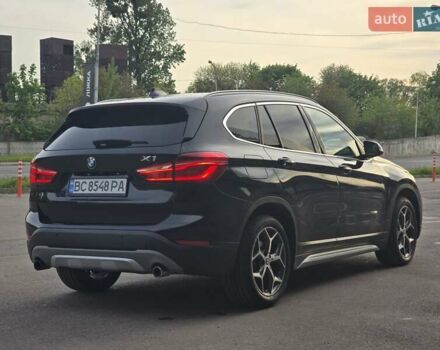 Чорний БМВ Х1, об'ємом двигуна 2 л та пробігом 110 тис. км за 18100 $, фото 2 на Automoto.ua