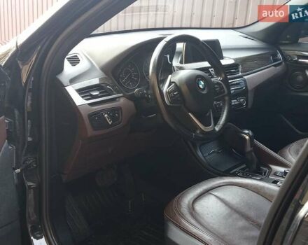 Чорний БМВ Х1, об'ємом двигуна 2 л та пробігом 125 тис. км за 13999 $, фото 1 на Automoto.ua