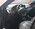 Чорний БМВ Х1, об'ємом двигуна 2 л та пробігом 125 тис. км за 13999 $, фото 1 на Automoto.ua