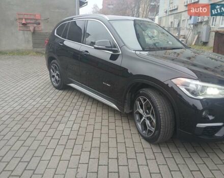 Чорний БМВ Х1, об'ємом двигуна 2 л та пробігом 120 тис. км за 18300 $, фото 2 на Automoto.ua
