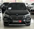 Черный БМВ Х1, объемом двигателя 2 л и пробегом 107 тыс. км за 20290 $, фото 1 на Automoto.ua