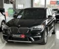 Чорний БМВ Х1, об'ємом двигуна 2 л та пробігом 107 тис. км за 20290 $, фото 1 на Automoto.ua