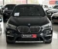 Чорний БМВ Х1, об'ємом двигуна 2 л та пробігом 107 тис. км за 20290 $, фото 1 на Automoto.ua