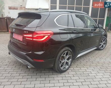 Чорний БМВ Х1, об'ємом двигуна 2 л та пробігом 120 тис. км за 18300 $, фото 1 на Automoto.ua