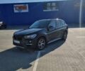 Чорний БМВ Х1, об'ємом двигуна 2 л та пробігом 75 тис. км за 18600 $, фото 1 на Automoto.ua