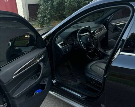 Чорний БМВ Х1, об'ємом двигуна 2 л та пробігом 148 тис. км за 19900 $, фото 2 на Automoto.ua