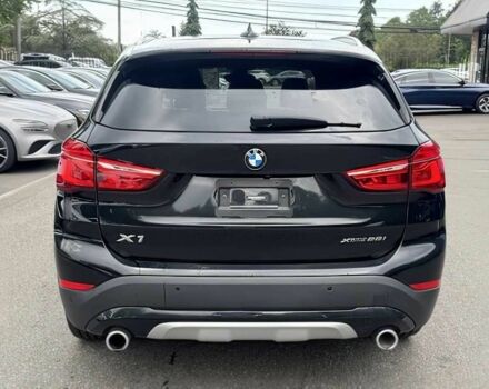 Чорний БМВ Х1, об'ємом двигуна 2 л та пробігом 18 тис. км за 9900 $, фото 4 на Automoto.ua