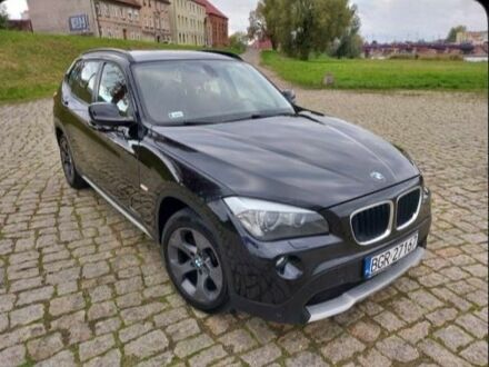 Черный БМВ Х1, объемом двигателя 2 л и пробегом 300 тыс. км за 8750 $, фото 1 на Automoto.ua